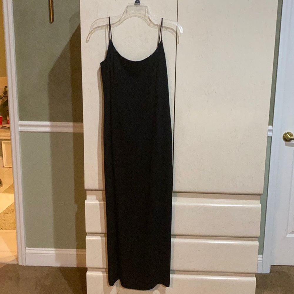 Women’s long black formal dress.